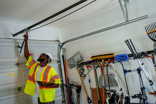 Professional Garage Door Maintenance technician working in Donald, OR